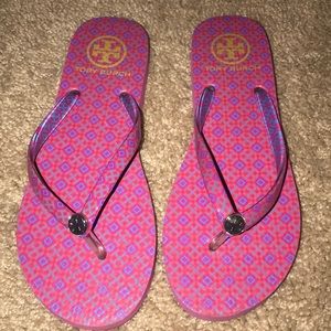 Tory Burch purple and pink patterned flip flops